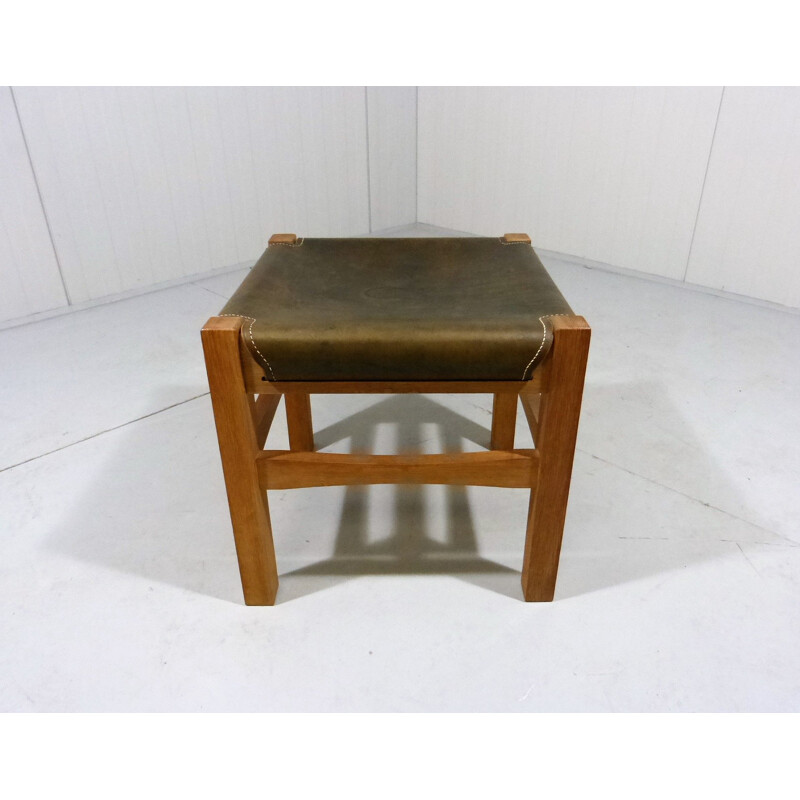 Vintage sturdy wooden stool with saddle leather seat, 1970