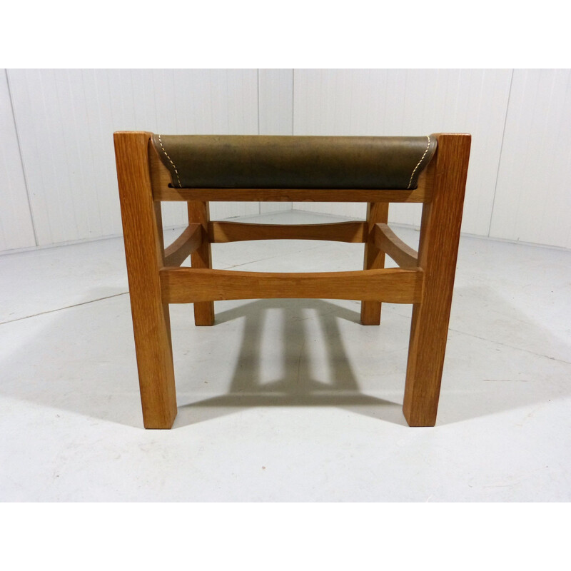 Vintage sturdy wooden stool with saddle leather seat, 1970