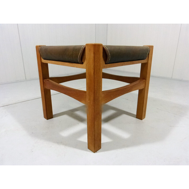 Vintage sturdy wooden stool with saddle leather seat, 1970