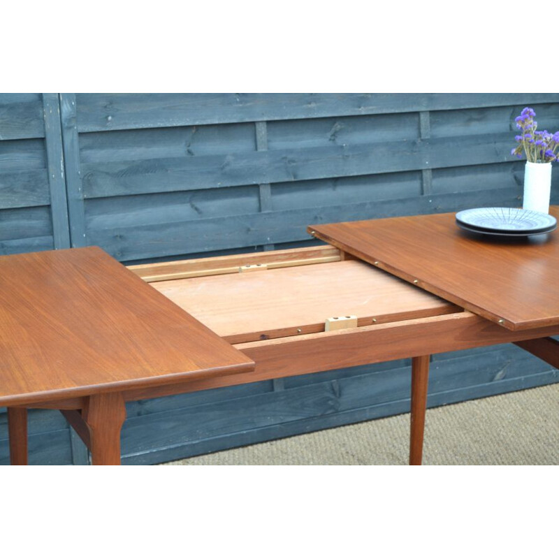 Vintage extensible teak dining table by William Watting Netherlands 1950s