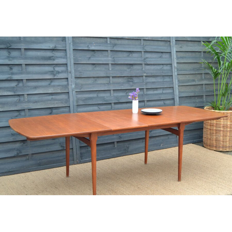 Vintage extensible teak dining table by William Watting Netherlands 1950s