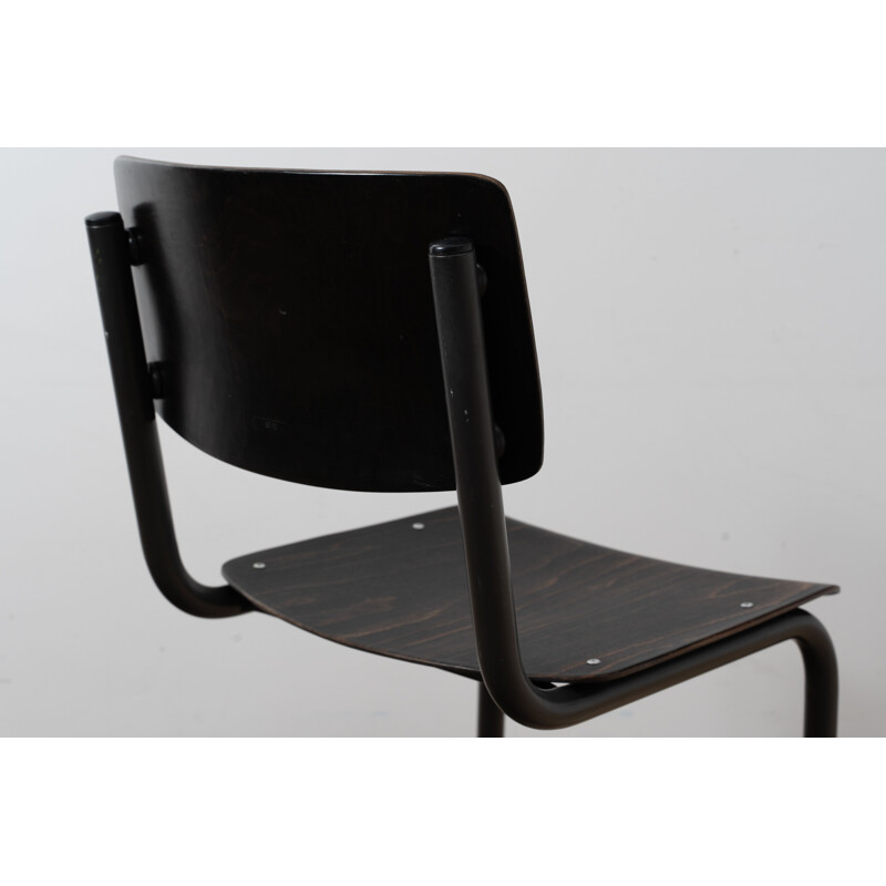 Vintage industrial chair with tubular structure