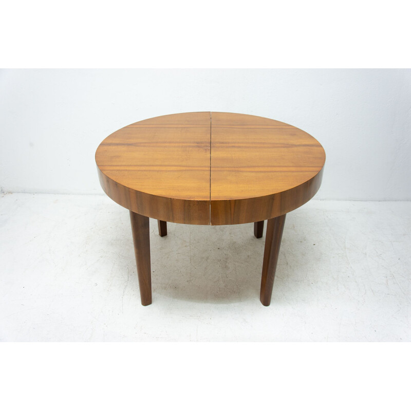 Mid century round folding dining table in walnut Czechoslovakia 1950s