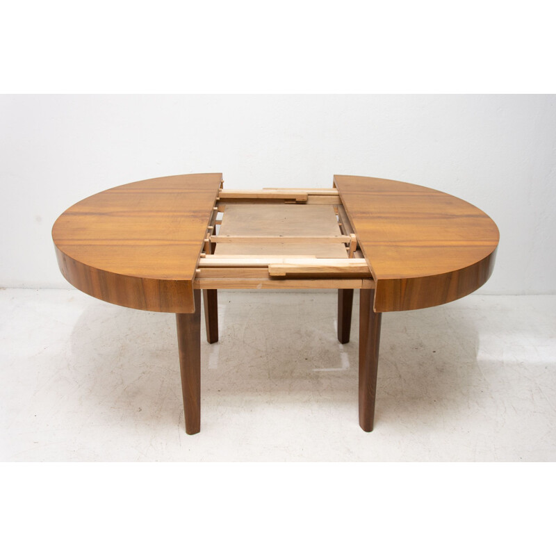 Mid century round folding dining table in walnut Czechoslovakia 1950s