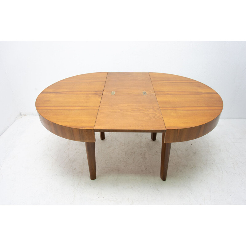 Mid century round folding dining table in walnut Czechoslovakia 1950s