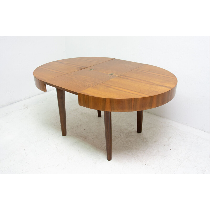 Mid century round folding dining table in walnut Czechoslovakia 1950s