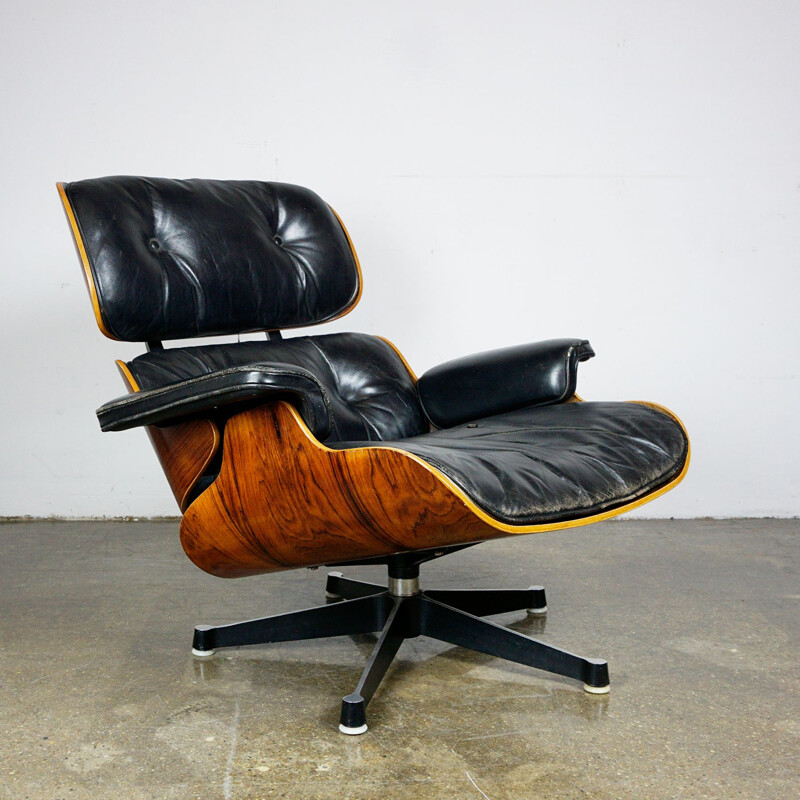 Fauteuil lounge vintage Eames en palissandre et cuir noir 1960