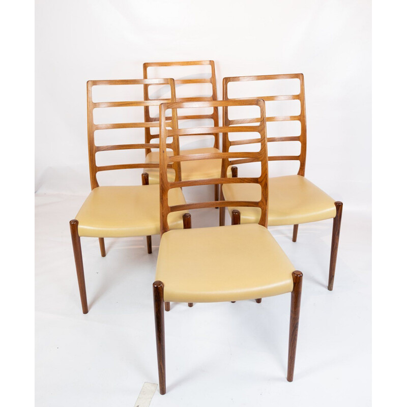 Set of 4 vintage dining chairs by N.O. Moller 1960s