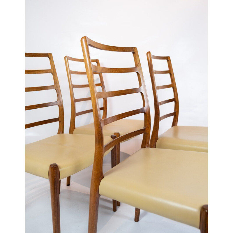 Set of 4 vintage dining chairs by N.O. Moller 1960s