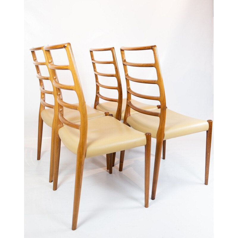 Set of 4 vintage dining chairs by N.O. Moller 1960s