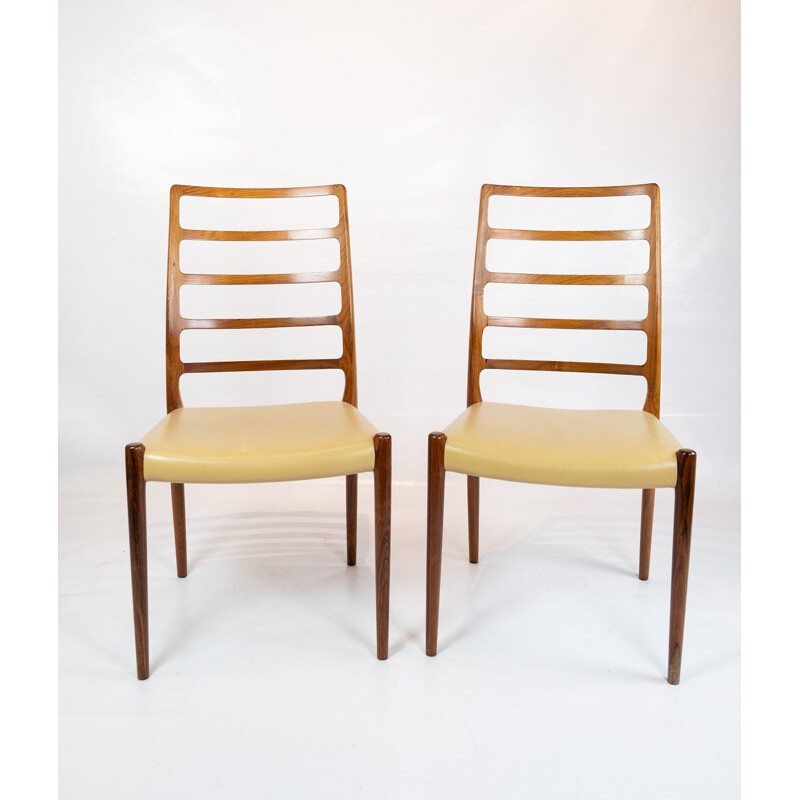 Set of 4 vintage dining chairs by N.O. Moller 1960s