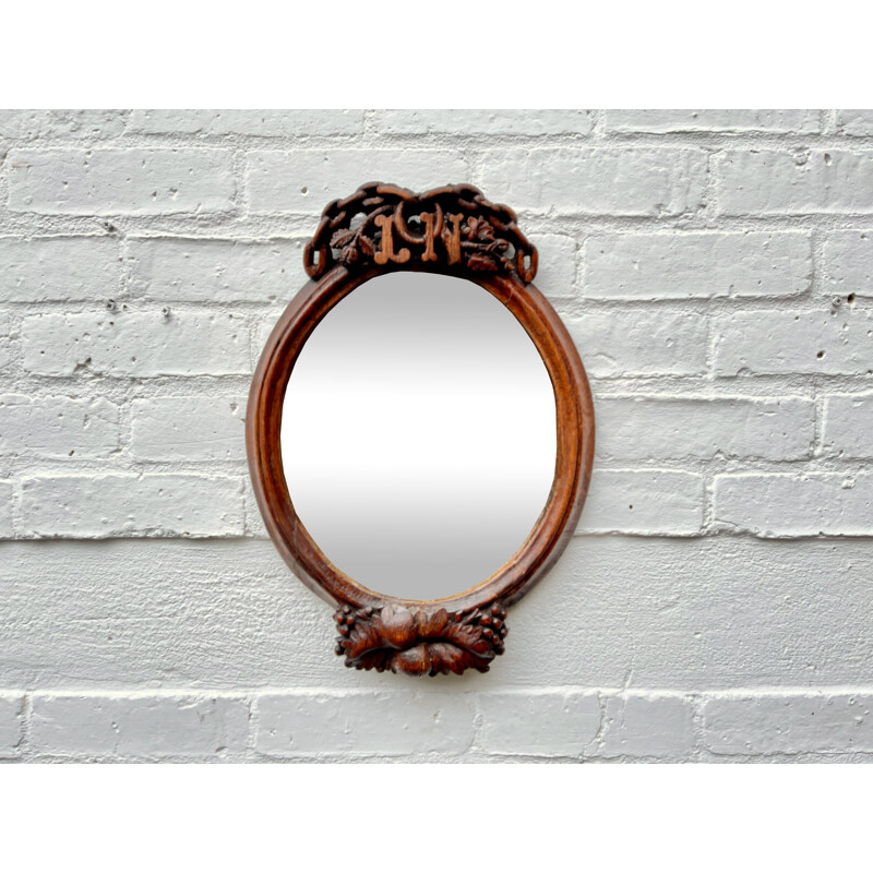 Vintage oval carved wood mirror