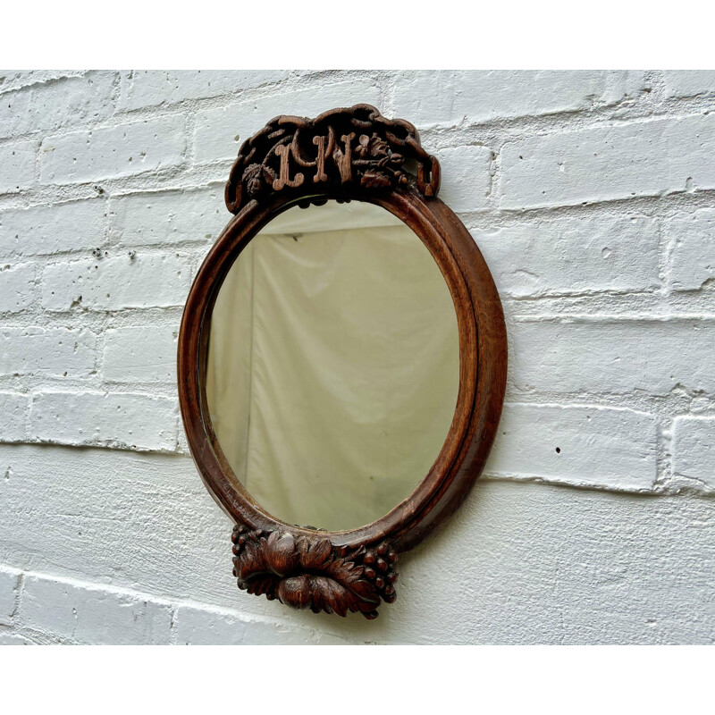 Vintage oval carved wood mirror