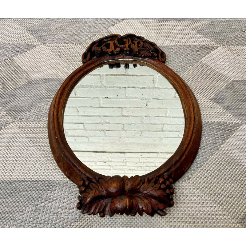 Miroir vintage ovale en bois sculpté