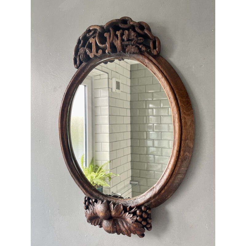 Miroir vintage ovale en bois sculpté