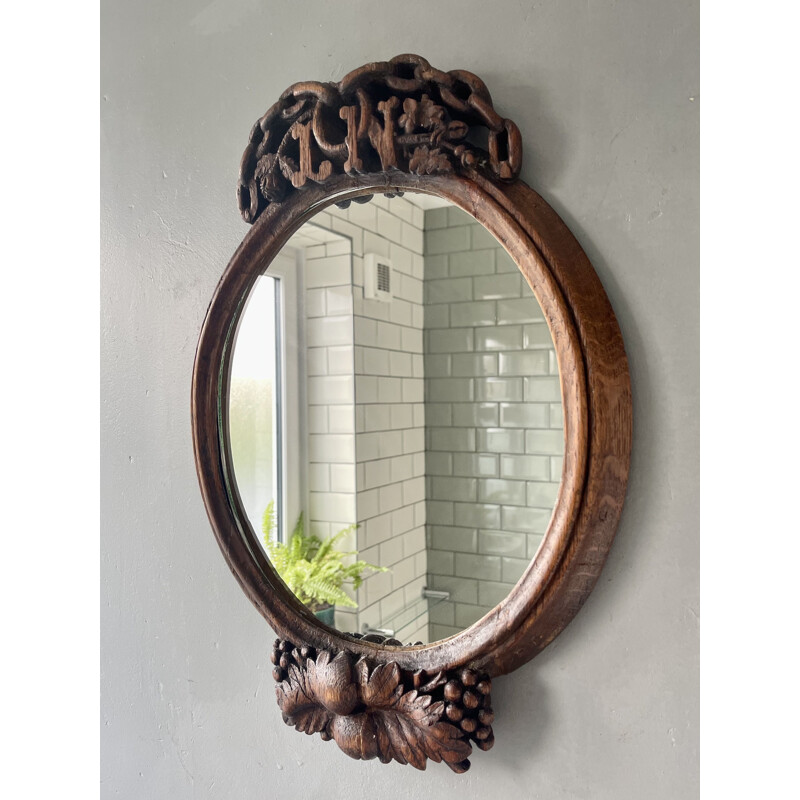 Vintage oval carved wood mirror