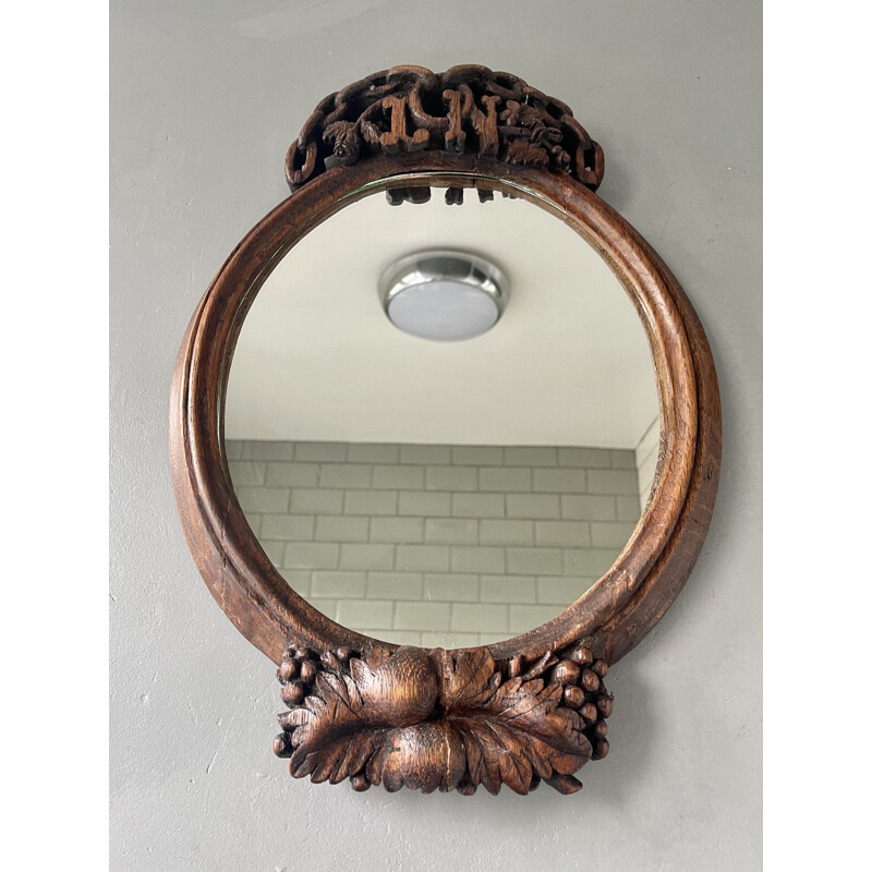 Vintage oval carved wood mirror
