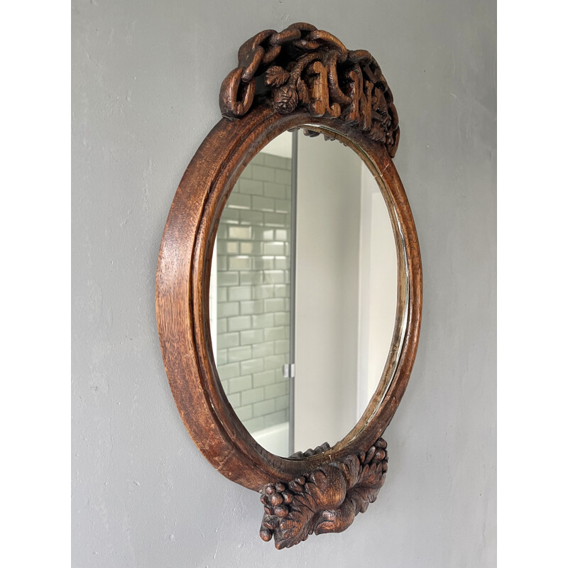 Miroir vintage ovale en bois sculpté