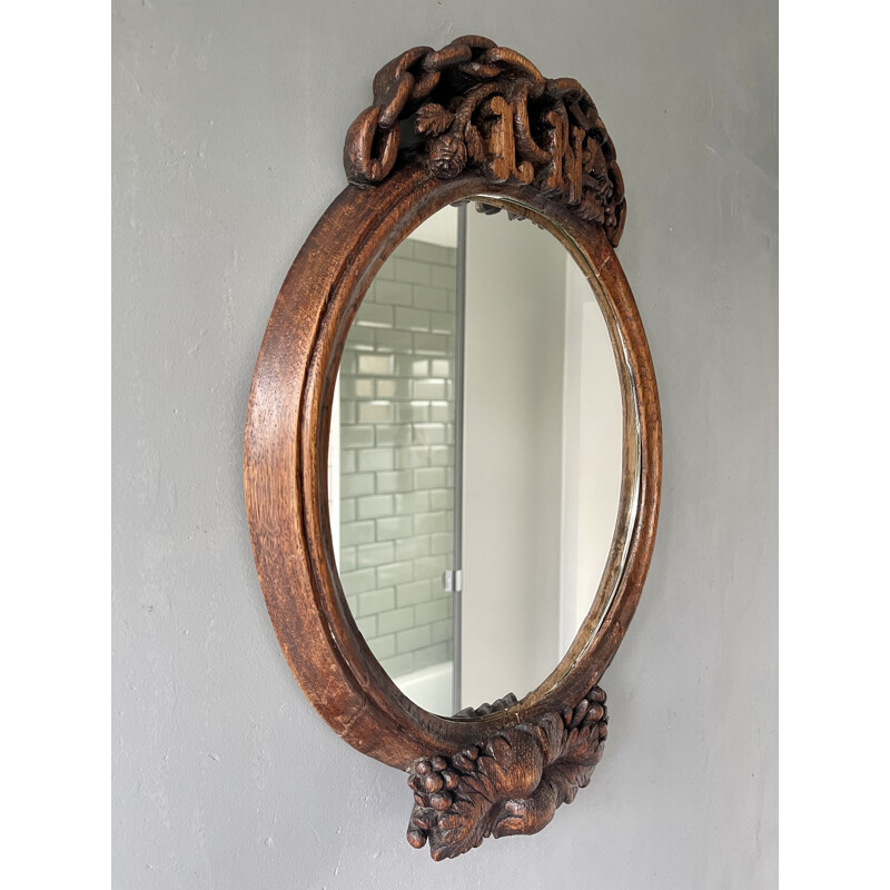 Vintage oval carved wood mirror