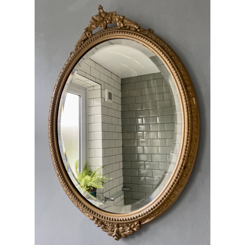 Vintage oval bevelled mirror with gold frame