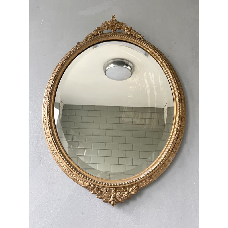 Vintage oval bevelled mirror with gold frame