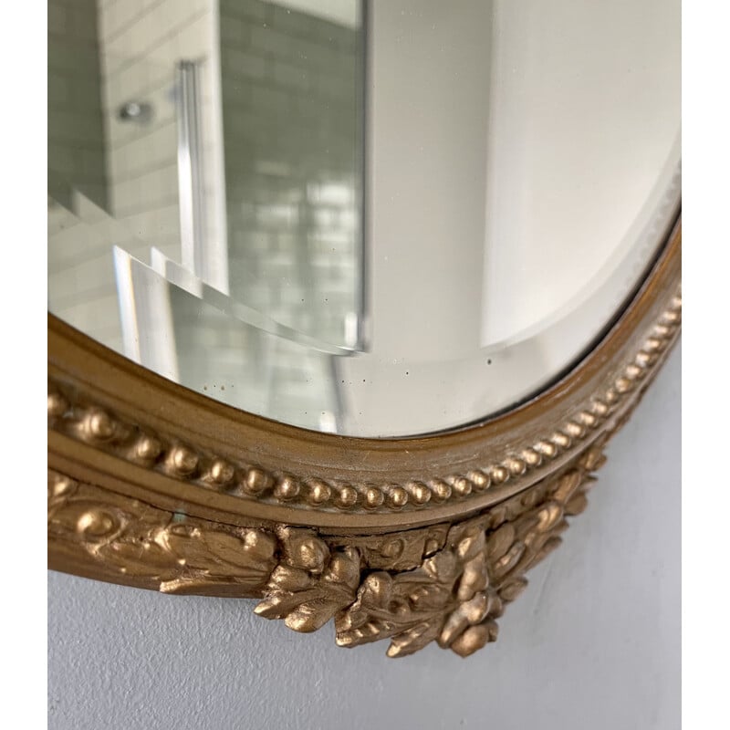 Vintage oval bevelled mirror with gold frame