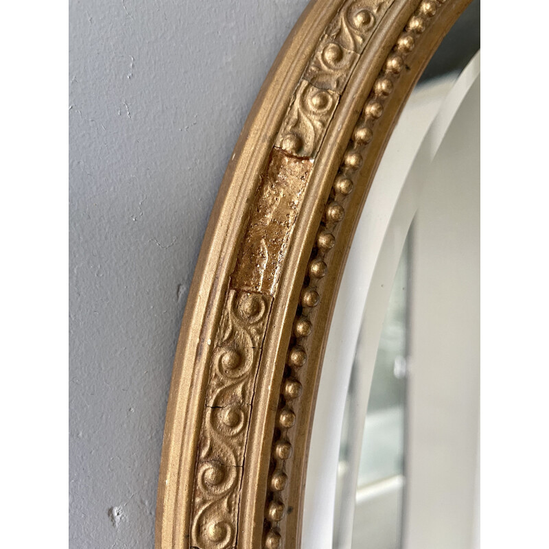 Vintage oval bevelled mirror with gold frame