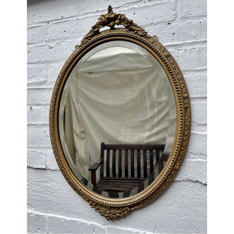 Vintage oval bevelled mirror with gold frame