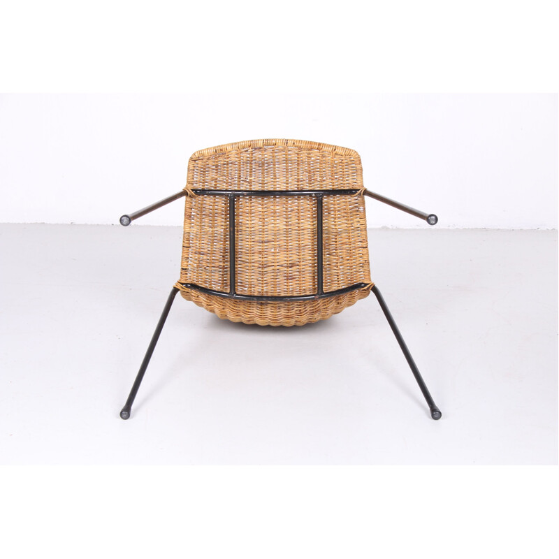 Vintage wicker chair with black metal legs 1960