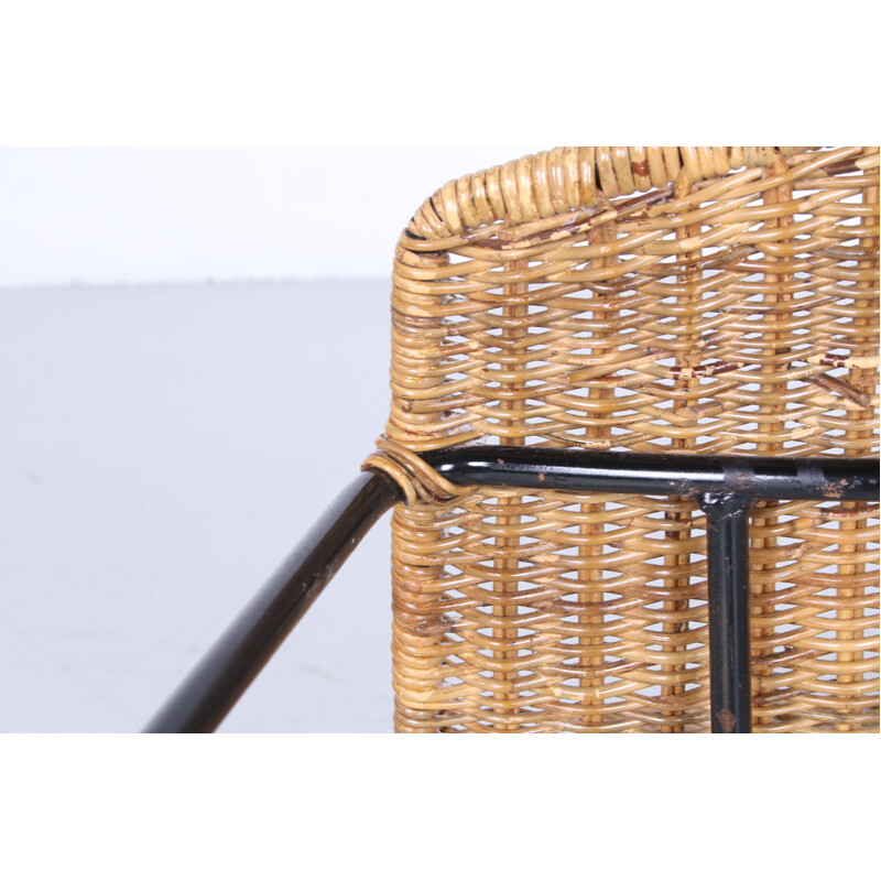 Vintage wicker chair with black metal legs 1960