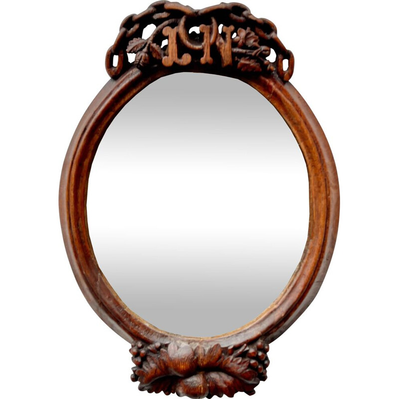 Vintage oval carved wood mirror