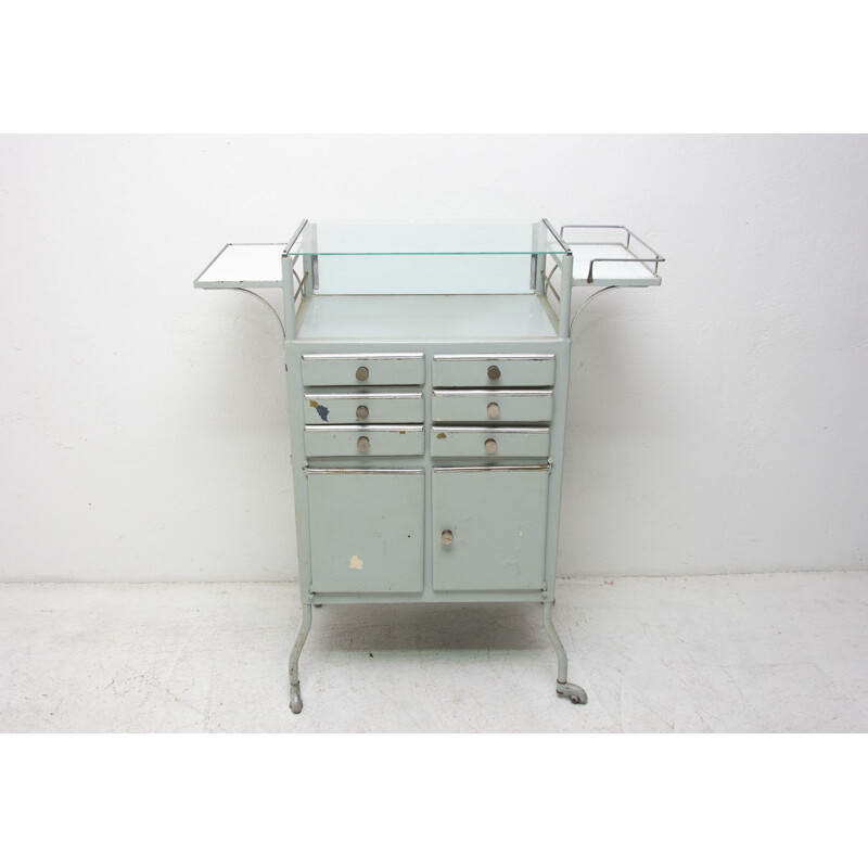 Vintage metal apothecary cabinet on wheels 1960s