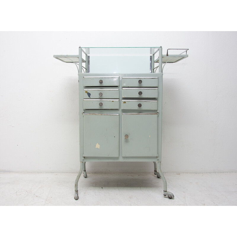 Vintage metal apothecary cabinet on wheels 1960s
