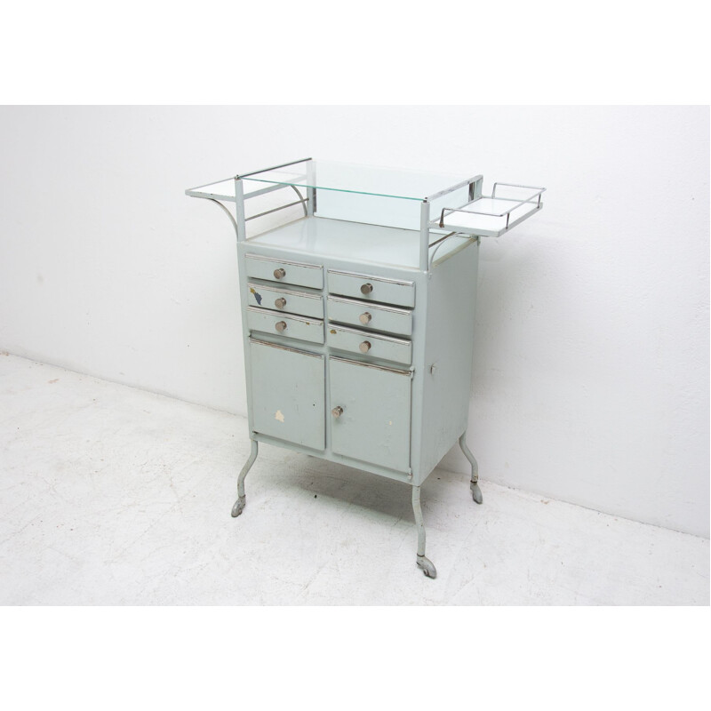 Vintage metal apothecary cabinet on wheels 1960s