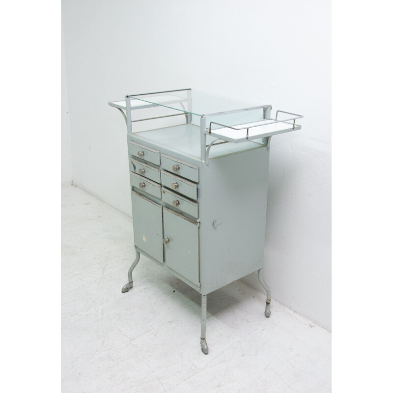 Vintage metal apothecary cabinet on wheels 1960s