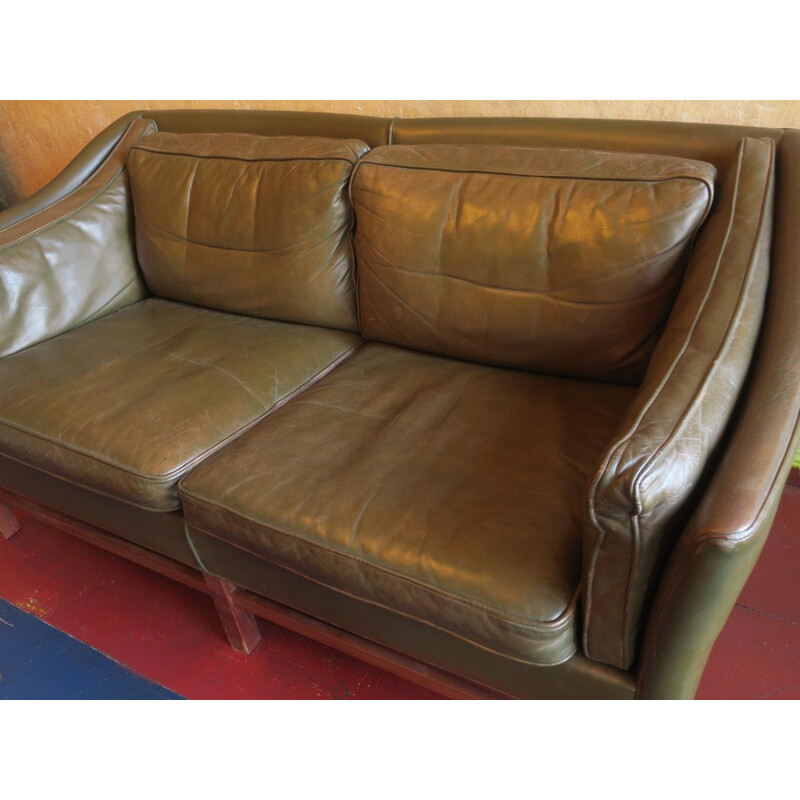 Vintage 2 seater sofa in dark olive green leather and teak frame by Grant, Denmark 1960