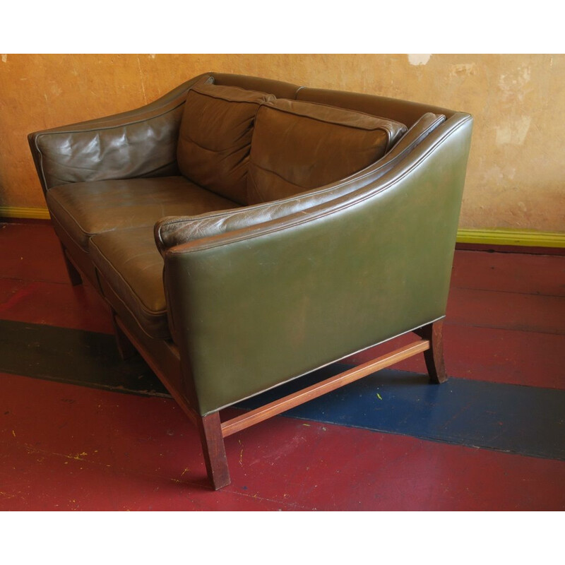 Vintage 2 seater sofa in dark olive green leather and teak frame by Grant, Denmark 1960