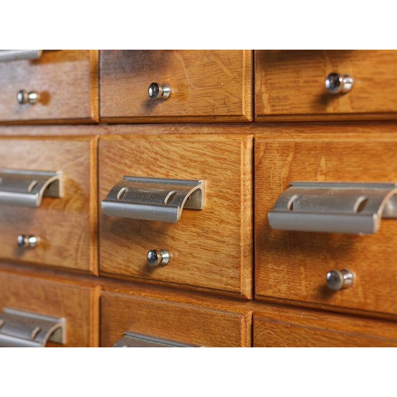 Vintage cabinet 30 drawers on 4 black steel feet 1950s