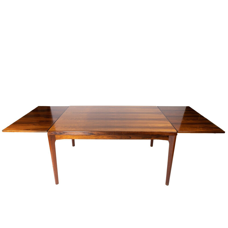 Vintage Dining table in rosewood with extensions by Henning Kjærnulf and by Vejle Furniture Factory 1960s