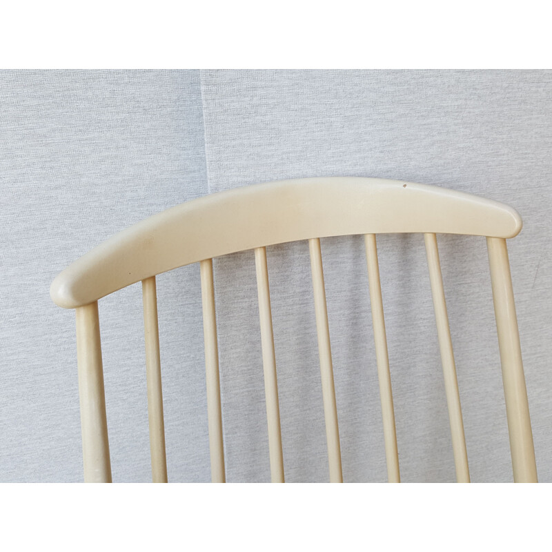 Vintage beige rocking chair bent wood.