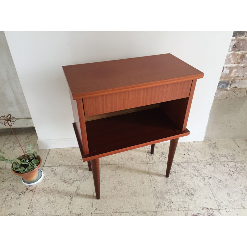 Vintage bedside table with compass feet