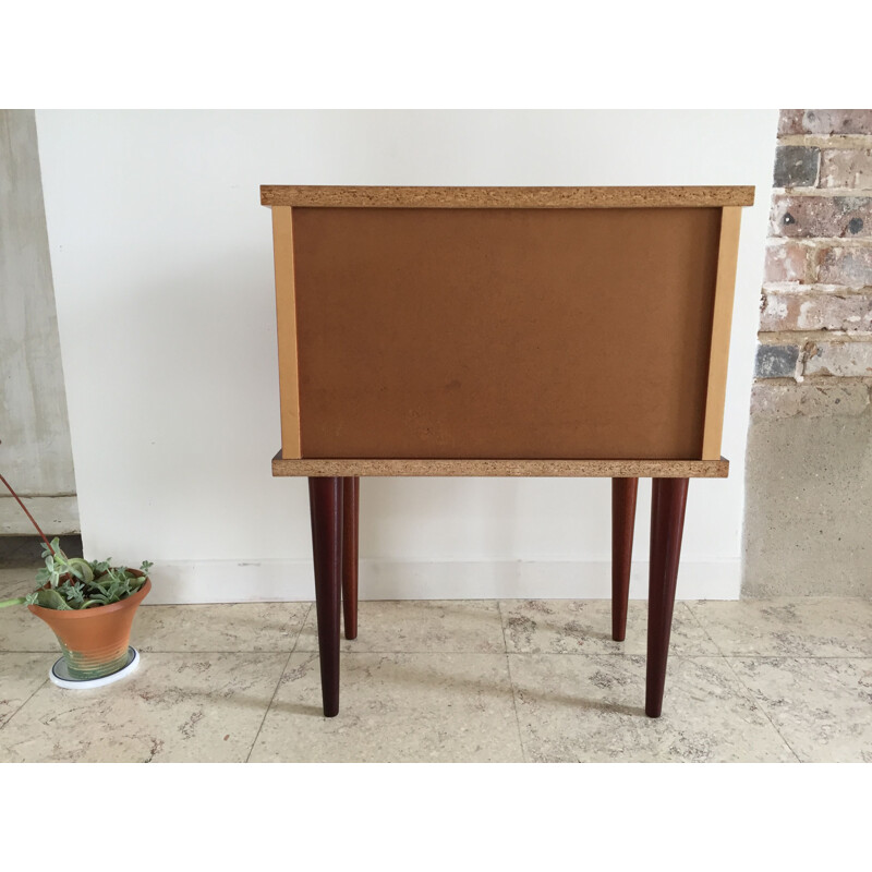 Vintage bedside table with compass feet