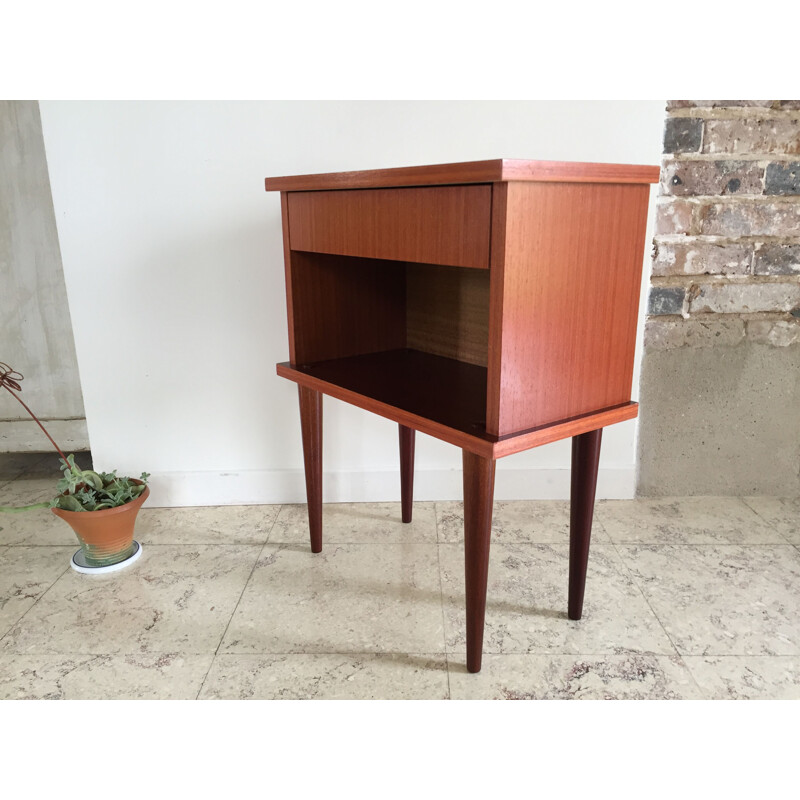 Vintage bedside table with compass feet