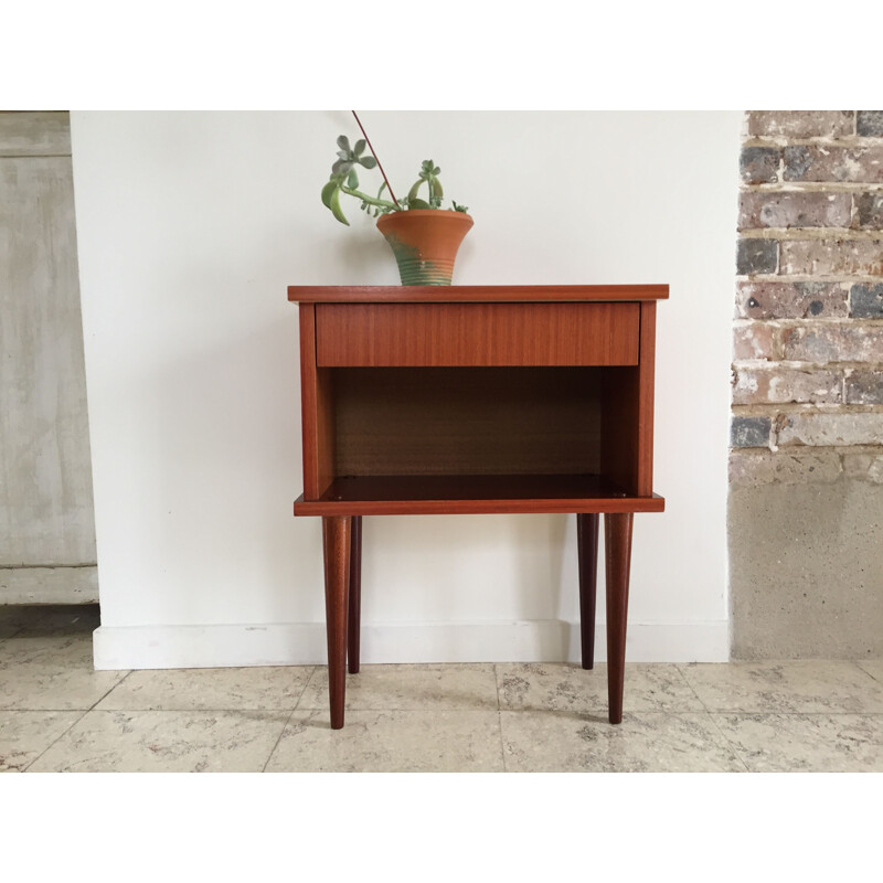 Vintage bedside table with compass feet