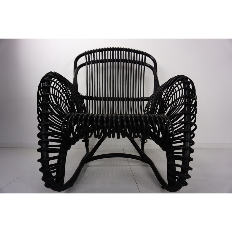 Vintage rattan armchair with matching ottoman