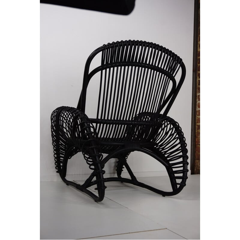 Vintage rattan armchair with matching ottoman