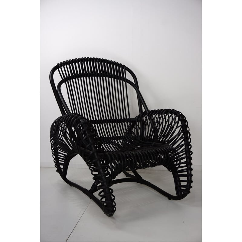 Vintage rattan armchair with matching ottoman