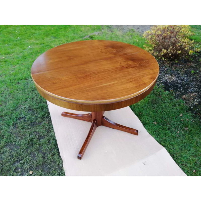 Vintage adjustable table with an extendable top
