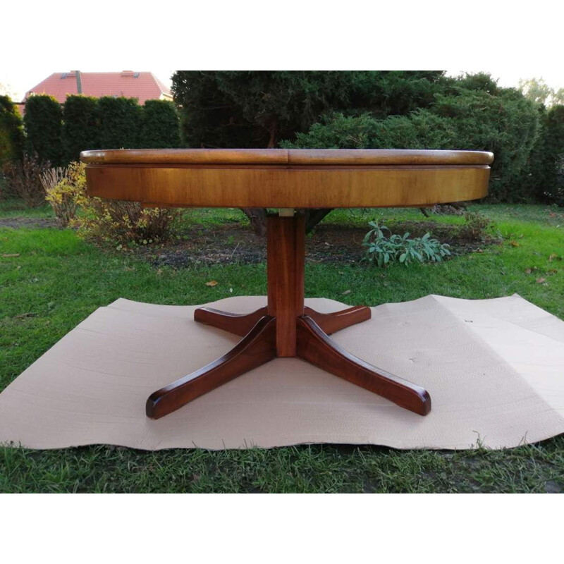 Vintage adjustable table with an extendable top