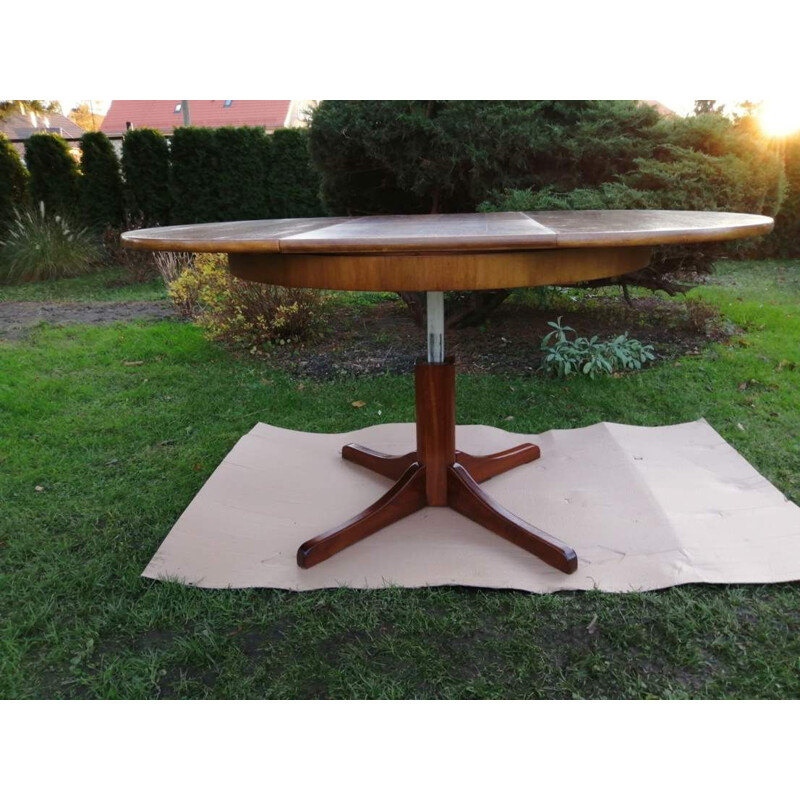 Vintage adjustable table with an extendable top